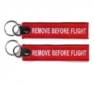 Custom remove before flight embroidered keychain