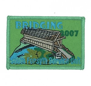 Flocking badges manufacturers bridging embroidery patch