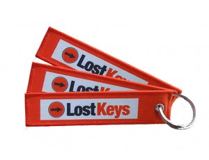 wholesale lost keys logo hot sale embroidery/woven Keychain supplier